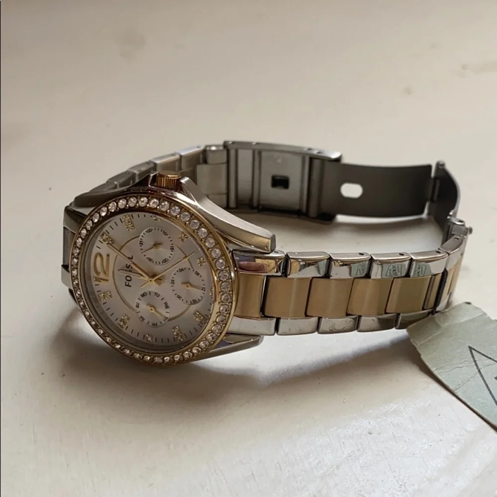 07:07  Fossil Stainless Steel Two Tone Bracelet Watch
